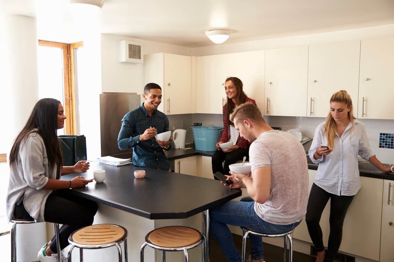 students in the kitchen sharing accommodation
