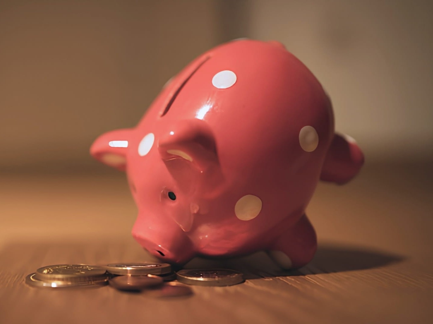 A piggy bank and coins