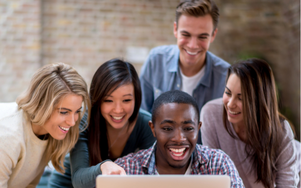 Flatmates using a laptop