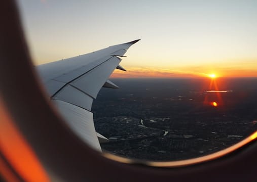 A view of the sunset from a plane