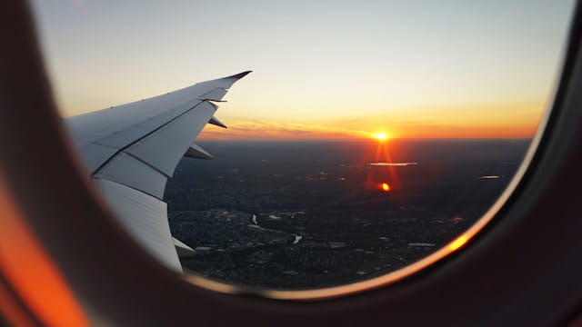 A view of the sunset from a plane