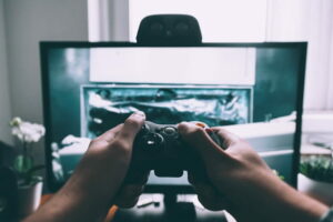 A gaming controller in front of the TV